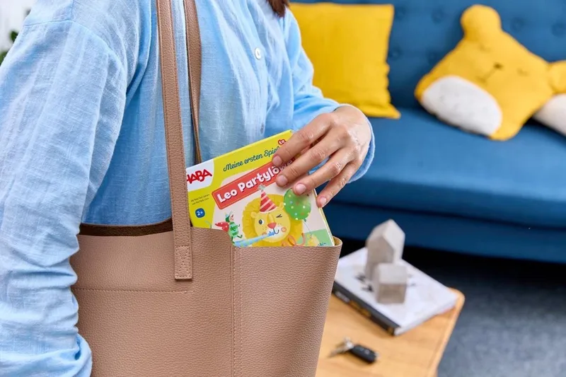 educatief spel Leo de Feestleeuw - kleurrijk kinderspel karton. van HABA – productfoto 1 van 5