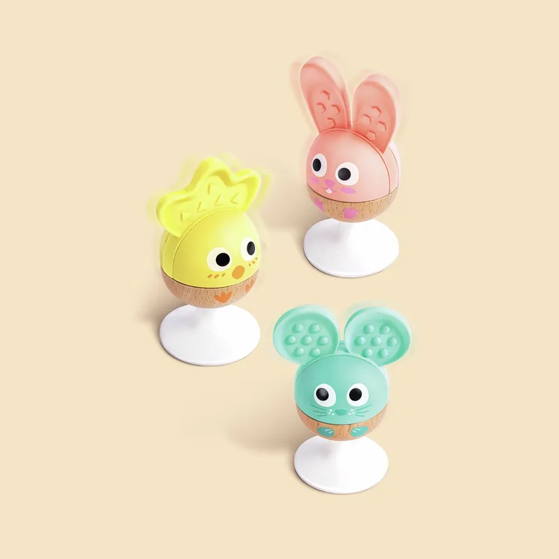 Rammelaar en Bijtring Set – 3 houten babyspeelgoed rammelaars muis, konijn en kuiken vanaf 0 maanden by Hape in Pink, Yellow, Blue, Brown, White – product photo