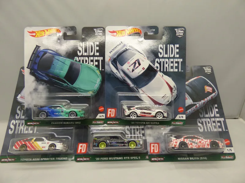 Auto Porsche 911 Junior 1:64 Wit/blauw de Hot Wheels en Blanc – photo du produit