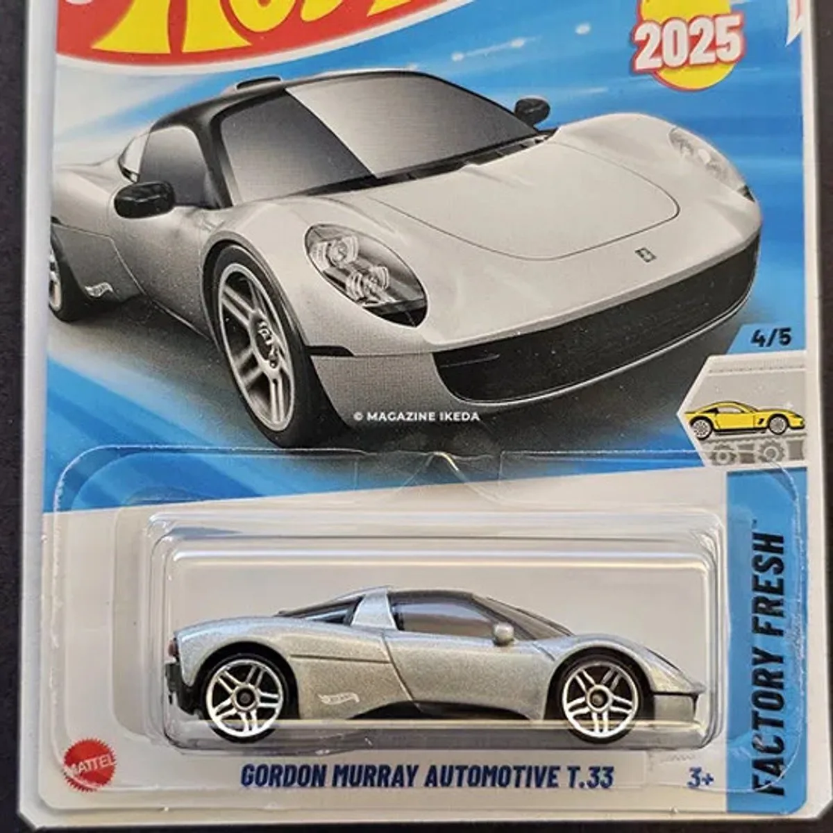 GORDON MURRAY AUTOMOTIVE T33 METALIC SILVER 90/250 FACTORY FRESCH 4/5 1:64 LONG CARD fra Hot Wheels i Metalic zilver – produktbillede