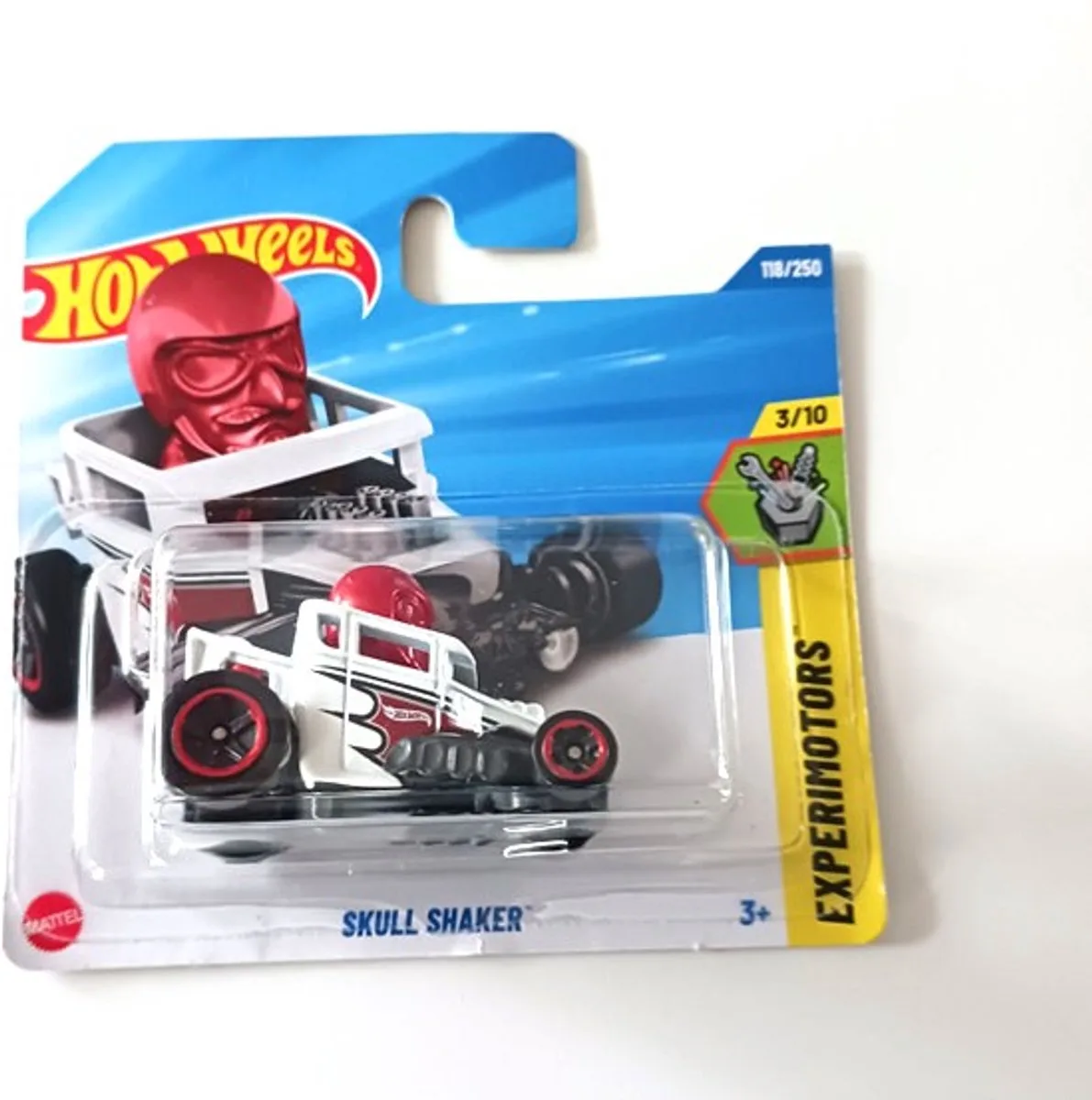 SKULL SHAKER 118/250 HW EXPERIMOTORS 3/10 1:64 SHORT CARD 2025 de Hot Wheels en White red head – photo du produit