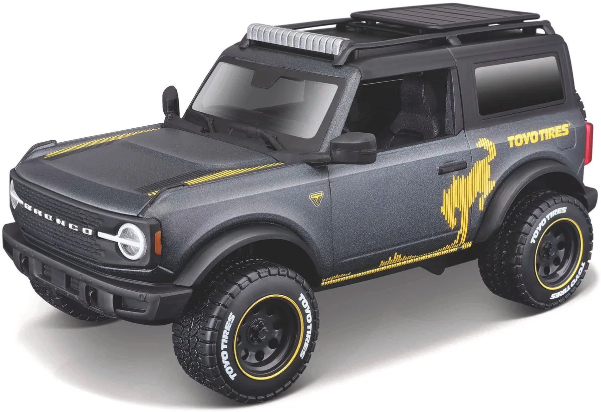 Ford Bronco - Modelauto - Schaal 1:24 de Maisto en Donker grijs, Jaune – photo du produit