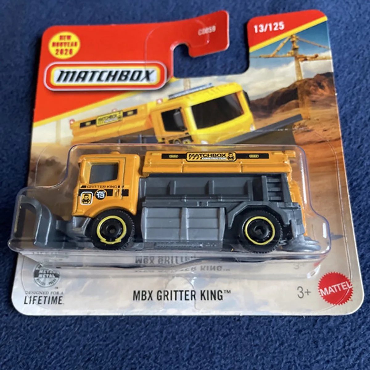 MBX GRITTER KING TRUCK 13/125 METAL (1:64) de Matchbox en Grey yellow – photo du produit