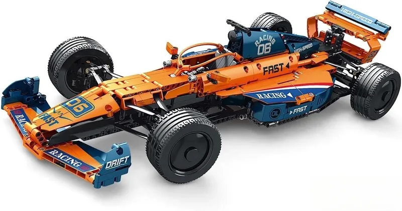 Reobrix 11006 Formule 1 RC Auto bouwset | F1 speed champions technisch constructie modelbouw geschikt voor lego | Educatief STEM speelgoed bouwpakketten voor kinderen & volwassenen | Incl radiografisch bestuurbare remote | Bouwdoos met 928 bouwstenen by Reobrix in Racing – RC F1 auto oranje – product photo