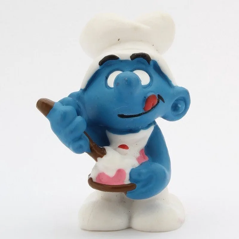 Smulsmurf met taart - Schleich speelfiguurtje - 5,5 cm - De smurfen von Schleich in Blauw – Produktfoto