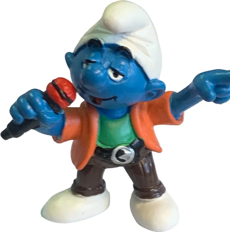 speelfiguur - smurf met microfoon / Zanger - De Smurfen - 20451 - 6 cm von Schleich in Blauw, wit, bruin, rood, groen, zwart – Produktfoto