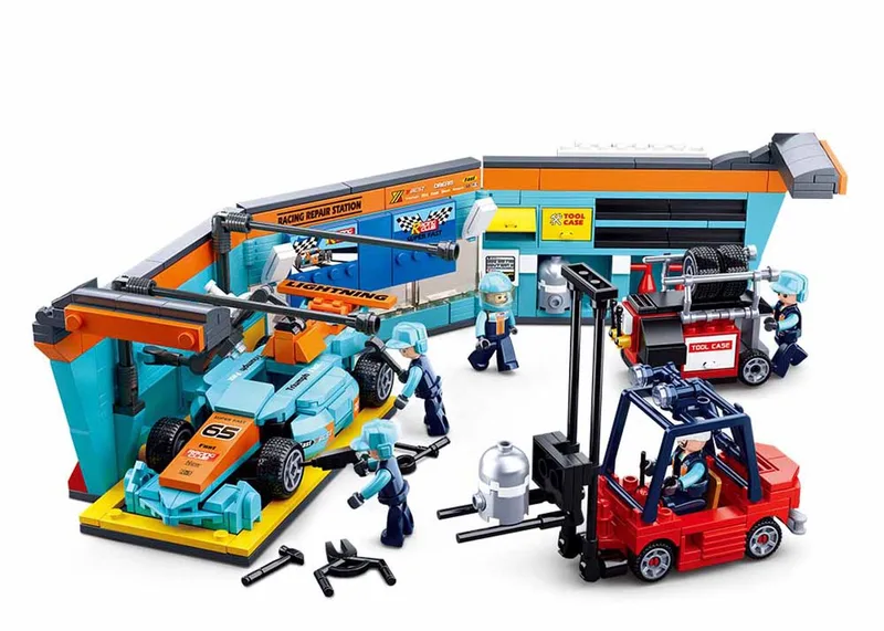 Formula 1 Pit Lane bouwspeelgoed kinderen vanaf 8 jaar – Constructiespeelgoed modelbouw race garage – bouwdoos met 555 bouwstenen en 5 minifiguren – M38-B0765 van Sluban in Multicolor – productfoto