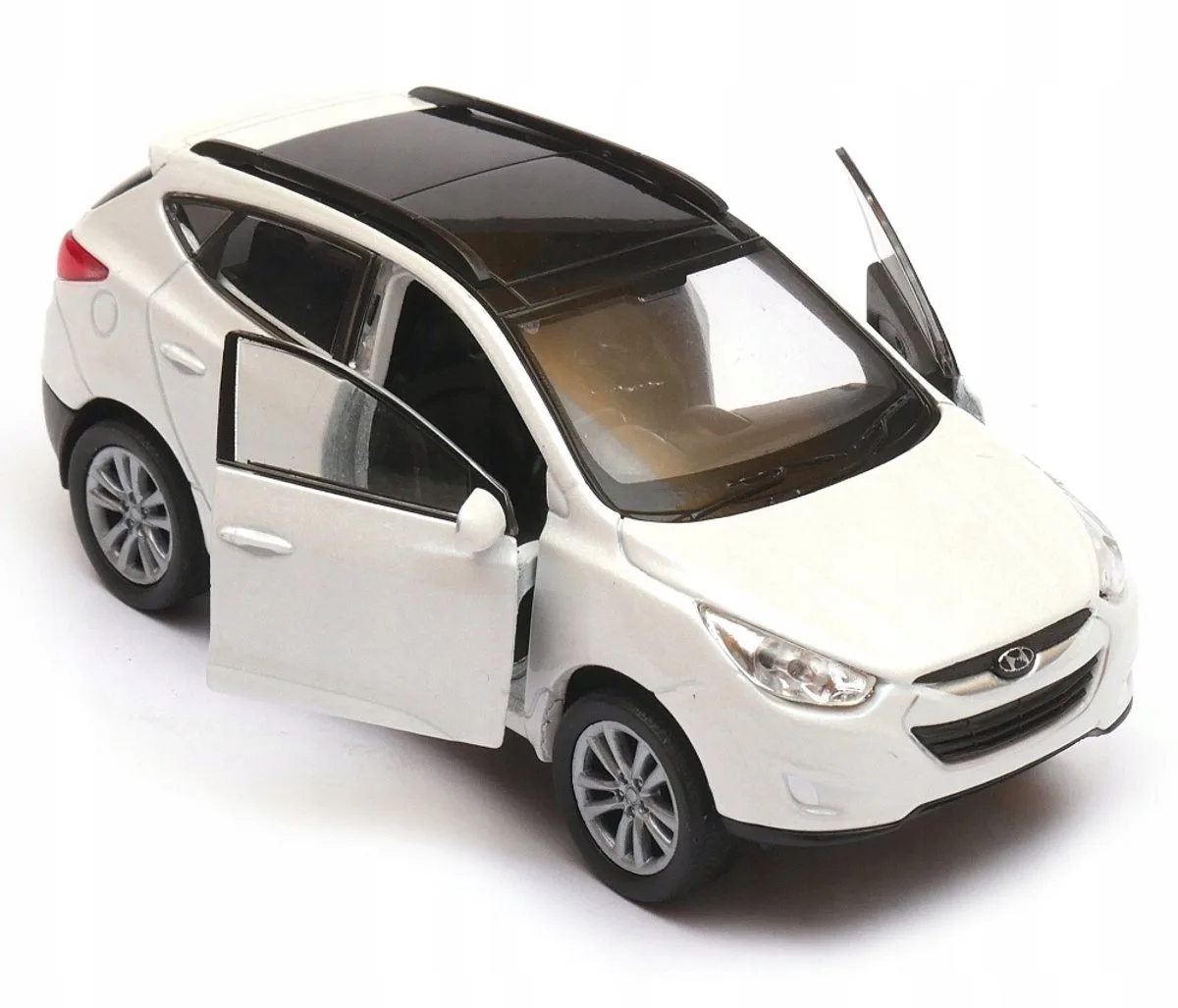 Hyundai Tucson 9 Schaal 1:34 met gegoten modelauto von Welly in Weiß – Produktfoto
