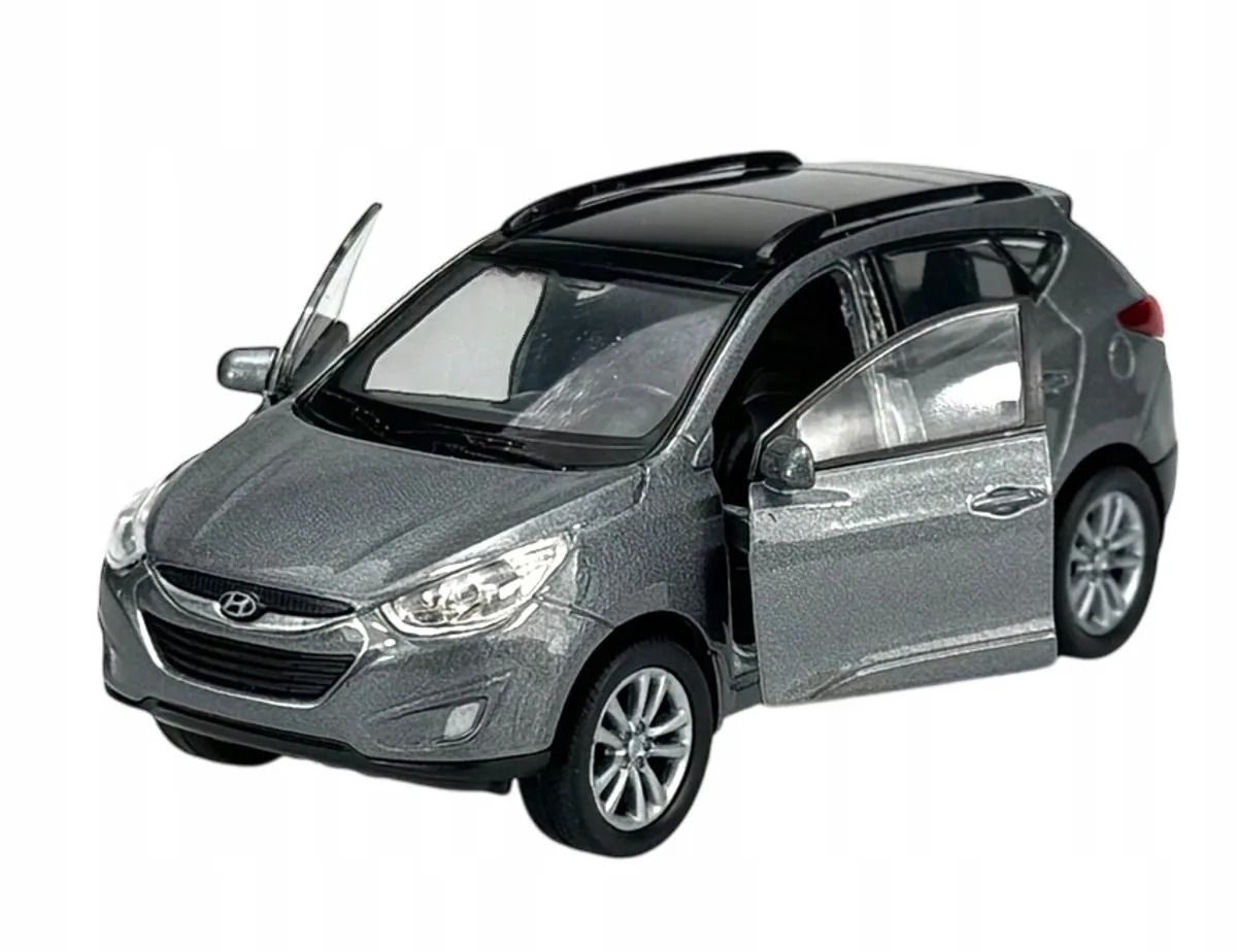 Hyundai Tucson IX 35 Metaal Model Auto Schaal 1:34 van Welly in Zilver – productfoto