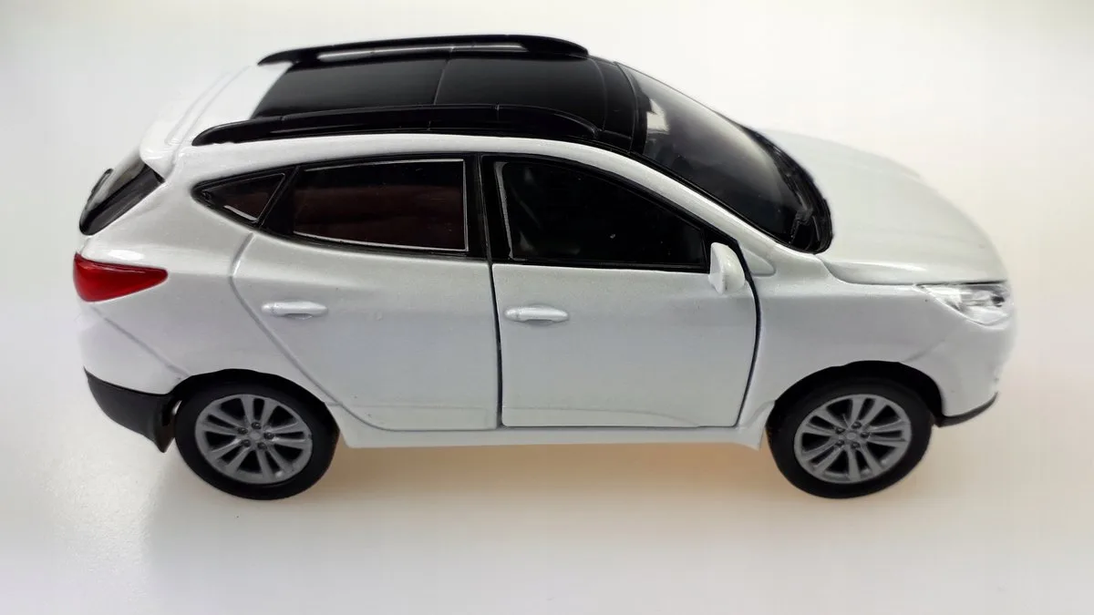 Hyundai Tucson IX 35 Wit Metaal Model Auto Schaal 1:34-1:39 fra Welly – produktbillede
