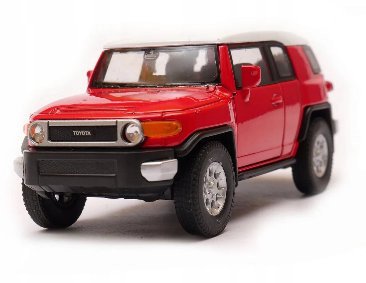 Toyota FJ Cruiser model auto schaal 1:34 fra Welly i Rød – produktbillede